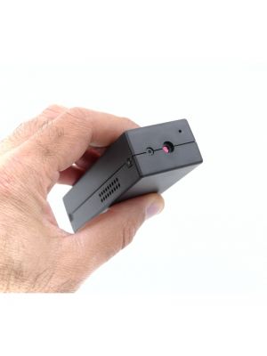 Car Security Camera with 25 Day Battery Backup held between fingers