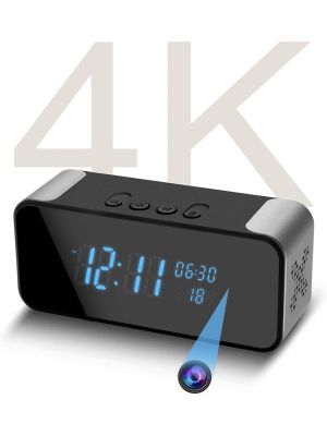 Modern black digital desk clock featuring a built-in Bluetooth speaker and integrated 4K security camera