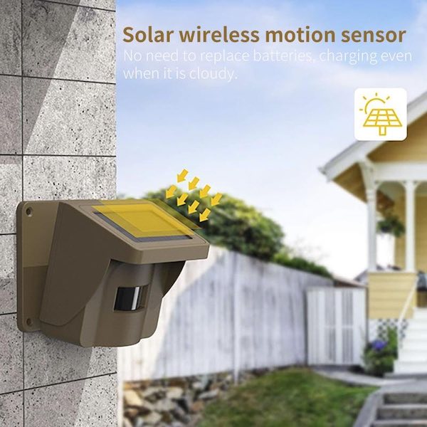 Solar motion sensor mounted to a wall